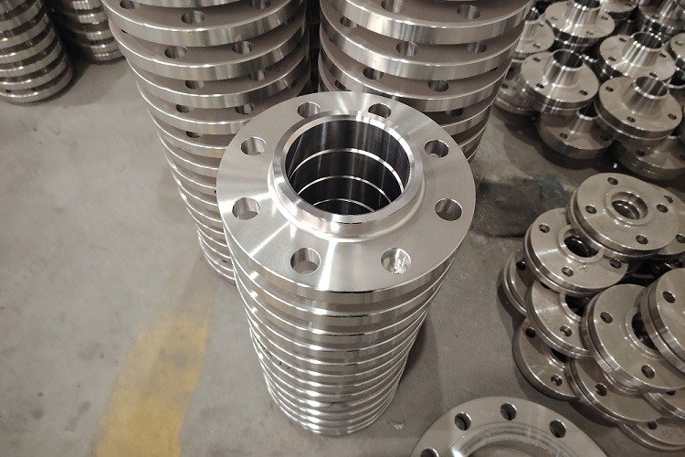 Lap joint flanges stacked with open bores visible